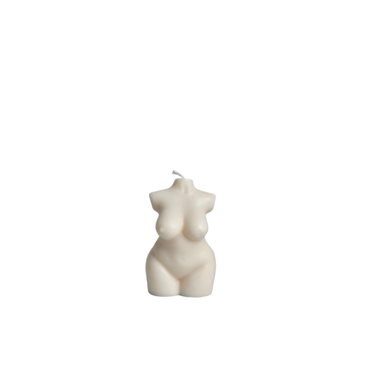 Een kleine, handgemaakte Body Curvy Kaars van Shade Candles, ontworpen met vrouwelijke rondingen, ideaal als decoratie of cadeau.